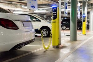 Electric car (new energy vehicle, NEV) is charged from the charg